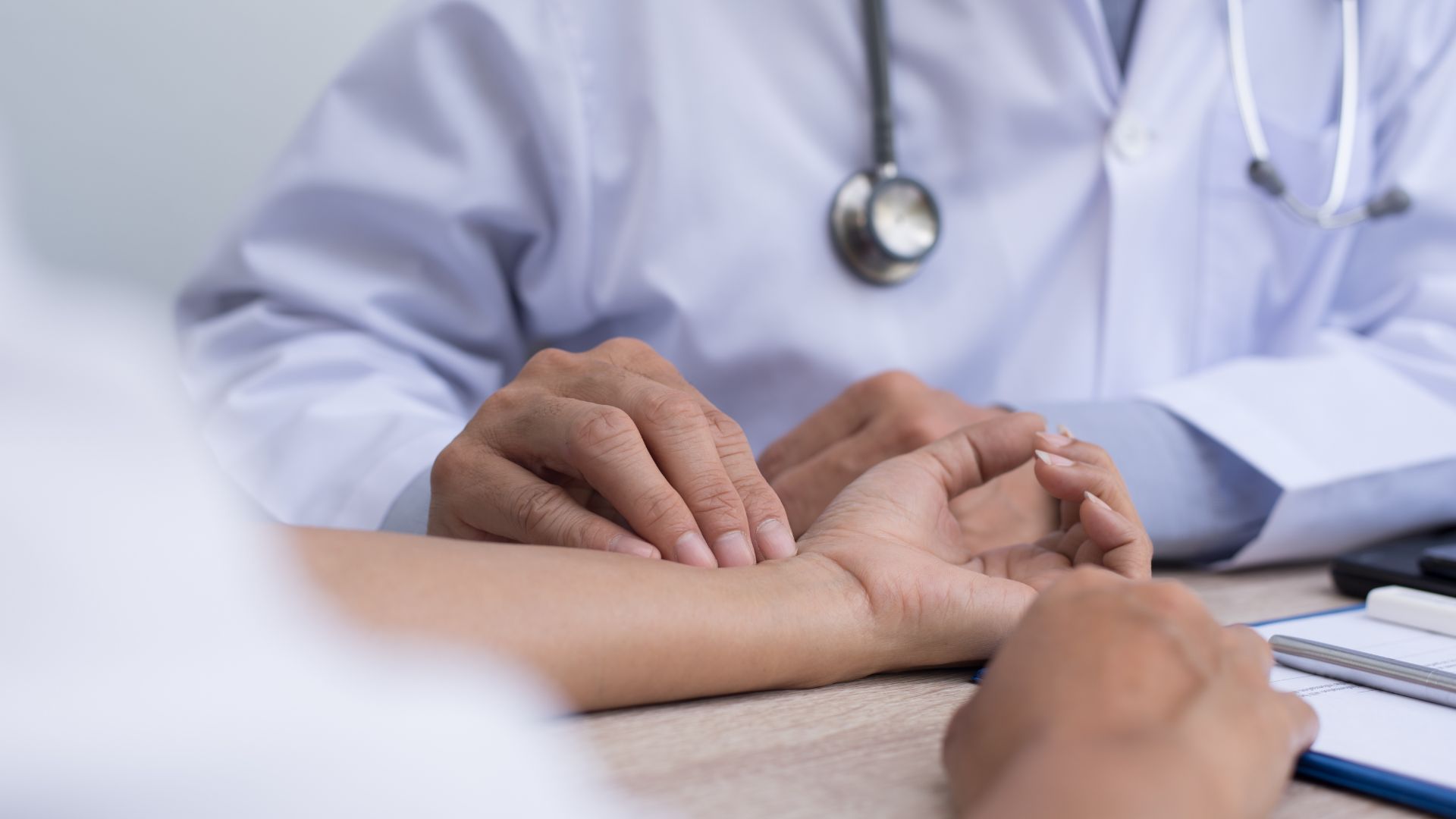 Doctor Checking Pulse