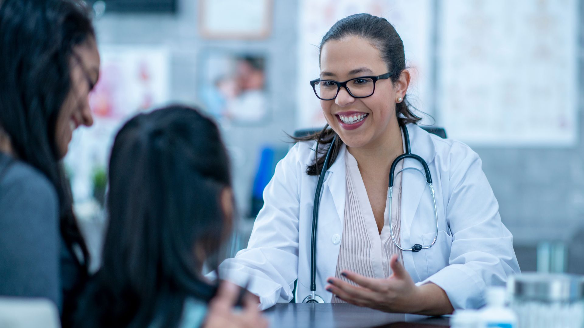 Doctor Connecting With Mother and Child